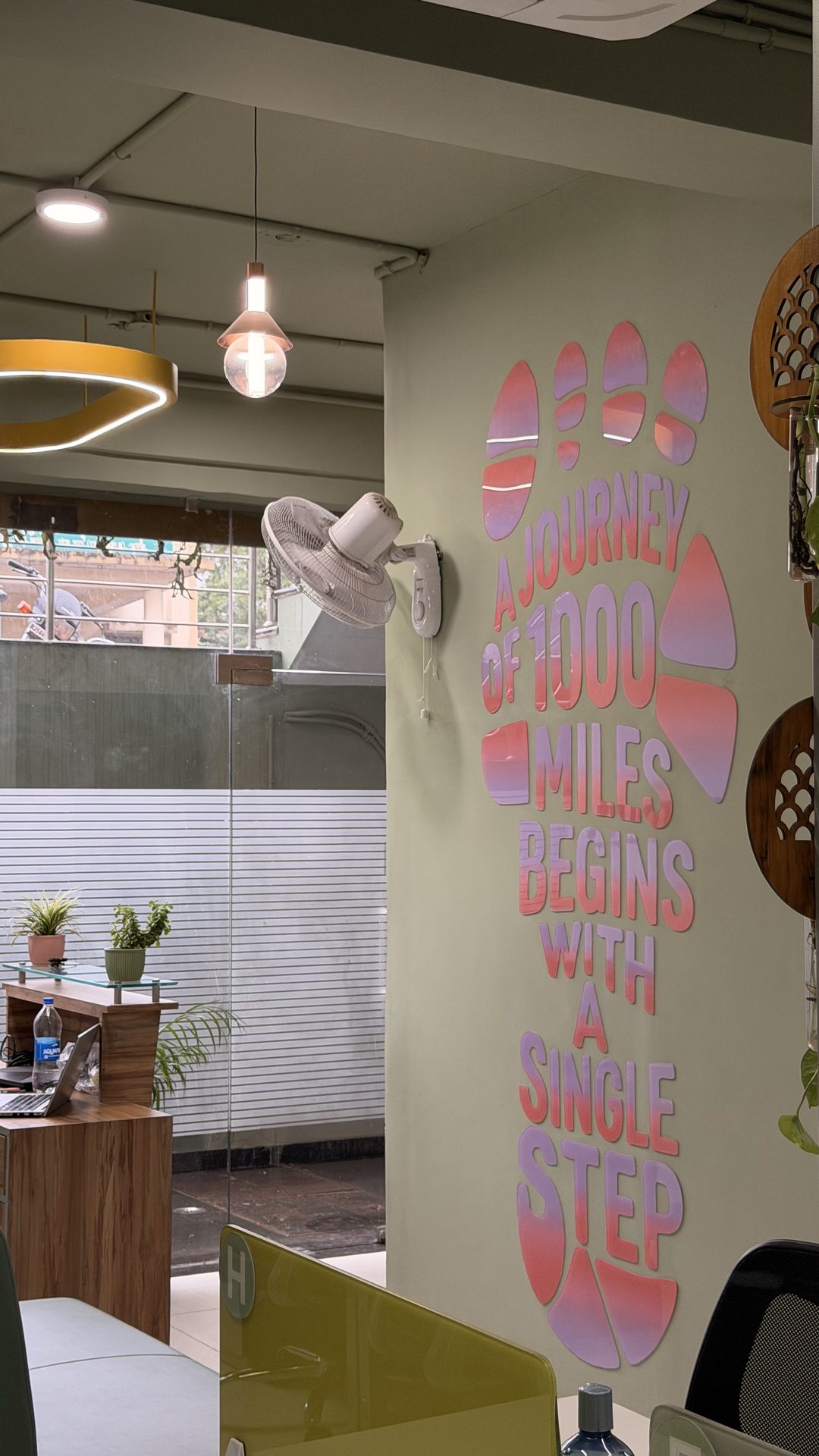 Journey of 1000 miles motivational mural near reception