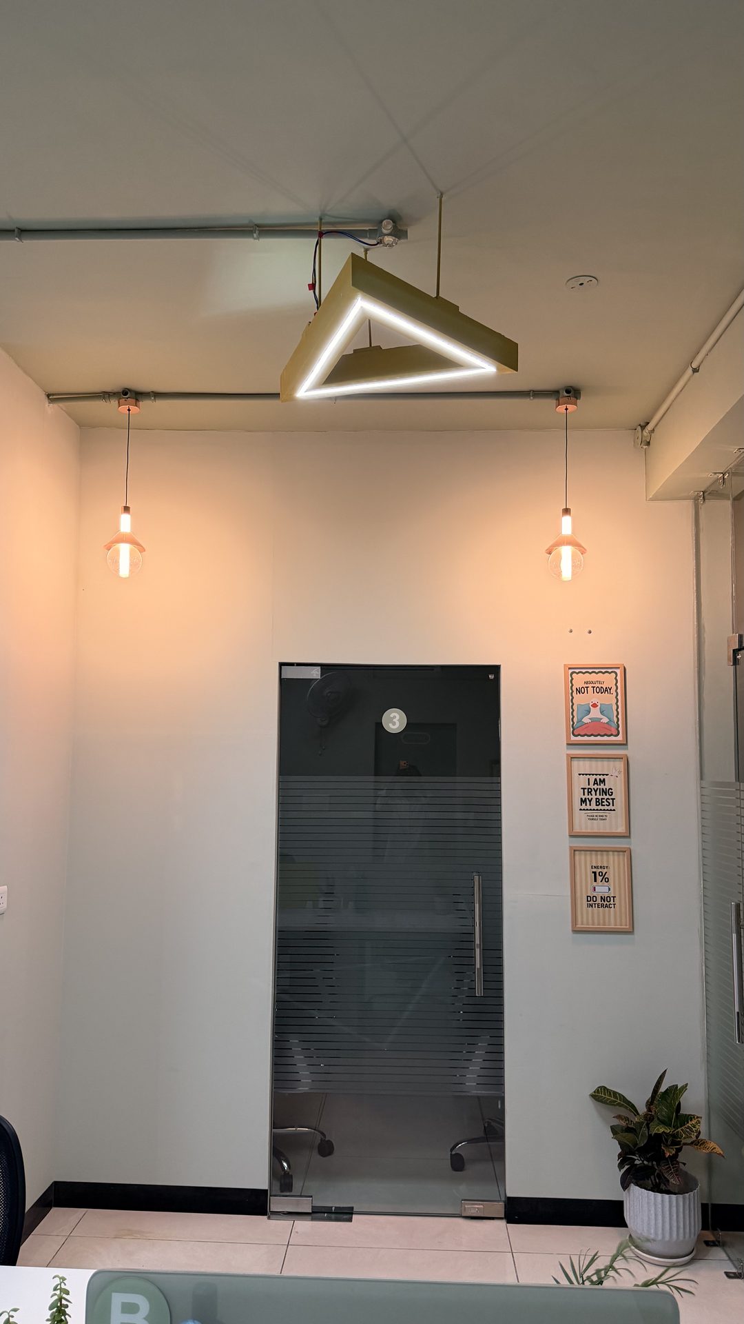 Karmhut corridor with motivational wall art